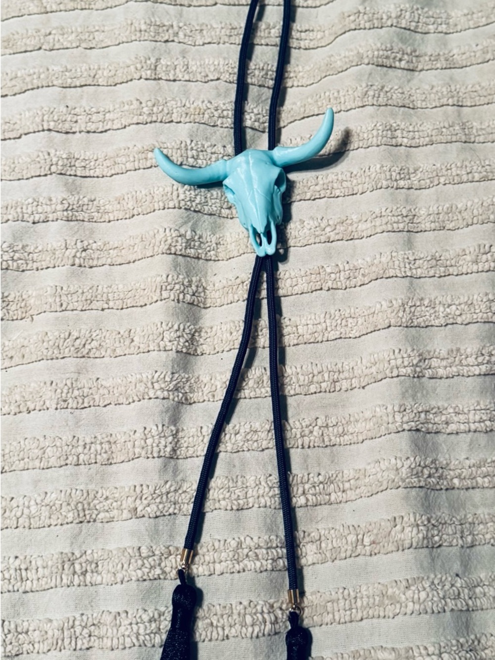 Turquoise Longhorn Bolo Tie with Navy Cord